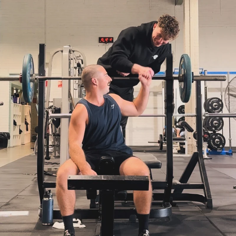 Alex coaching a client